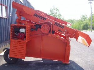 The 'Mini' screener with open engine compartment and wheels ready for towing,